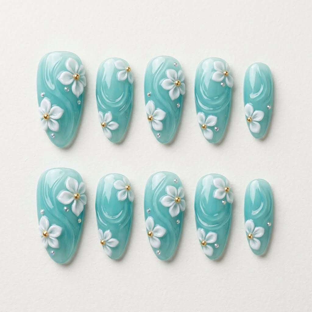 teal white 3d almond press on nails flower wave rhinestone flat lay 01