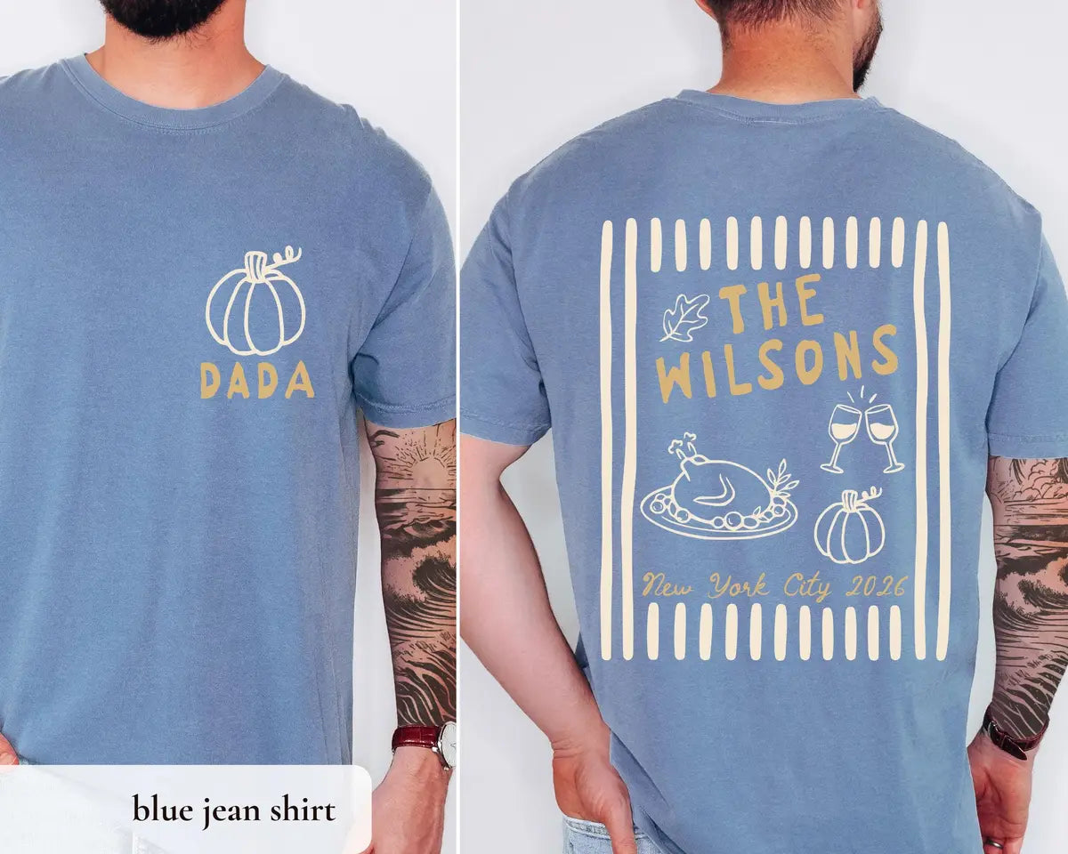 Man in a Blue Jean Comfort Colors tee, front with a gold pumpkin and DADA, back with The Wilsons and a roast turkey