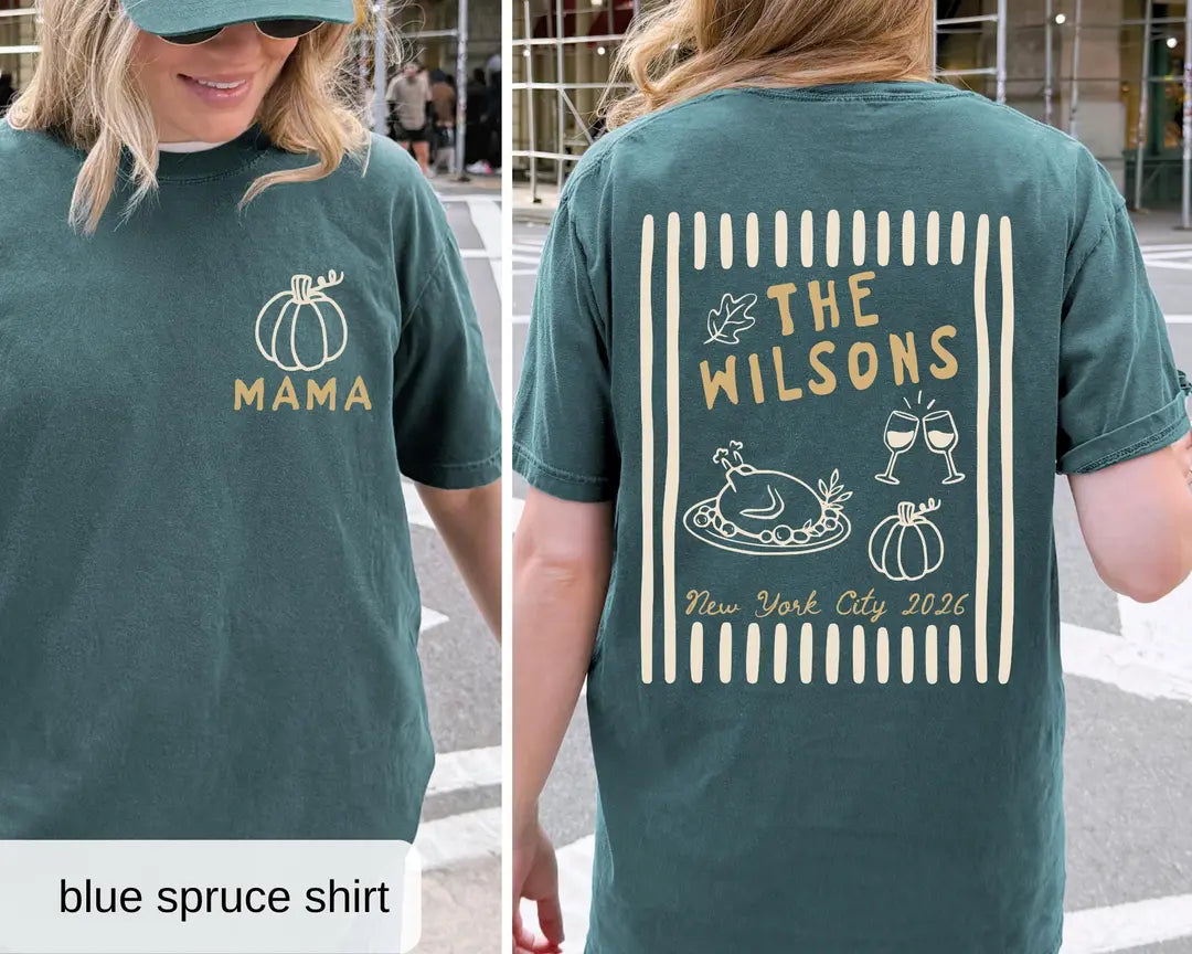 Woman in a Blue Spruce Comfort Colors tee, front with a pumpkin and MAMA, back with The Wilsons and New York City 2026
