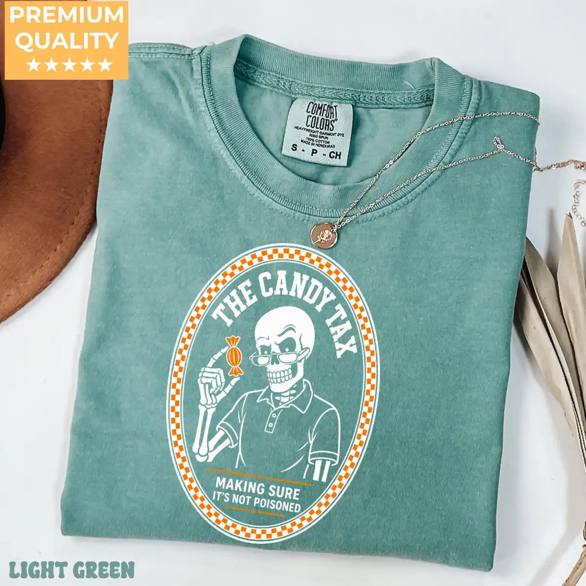 Comfort Colors T-shirt in Pepper featuring skeleton dad candy tax graphic