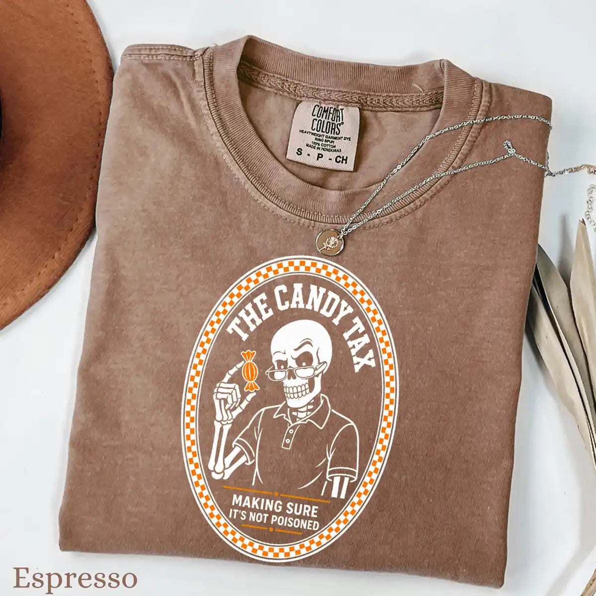 Comfort Colors T-shirt in Seafoam featuring skeleton dad candy tax graphic
