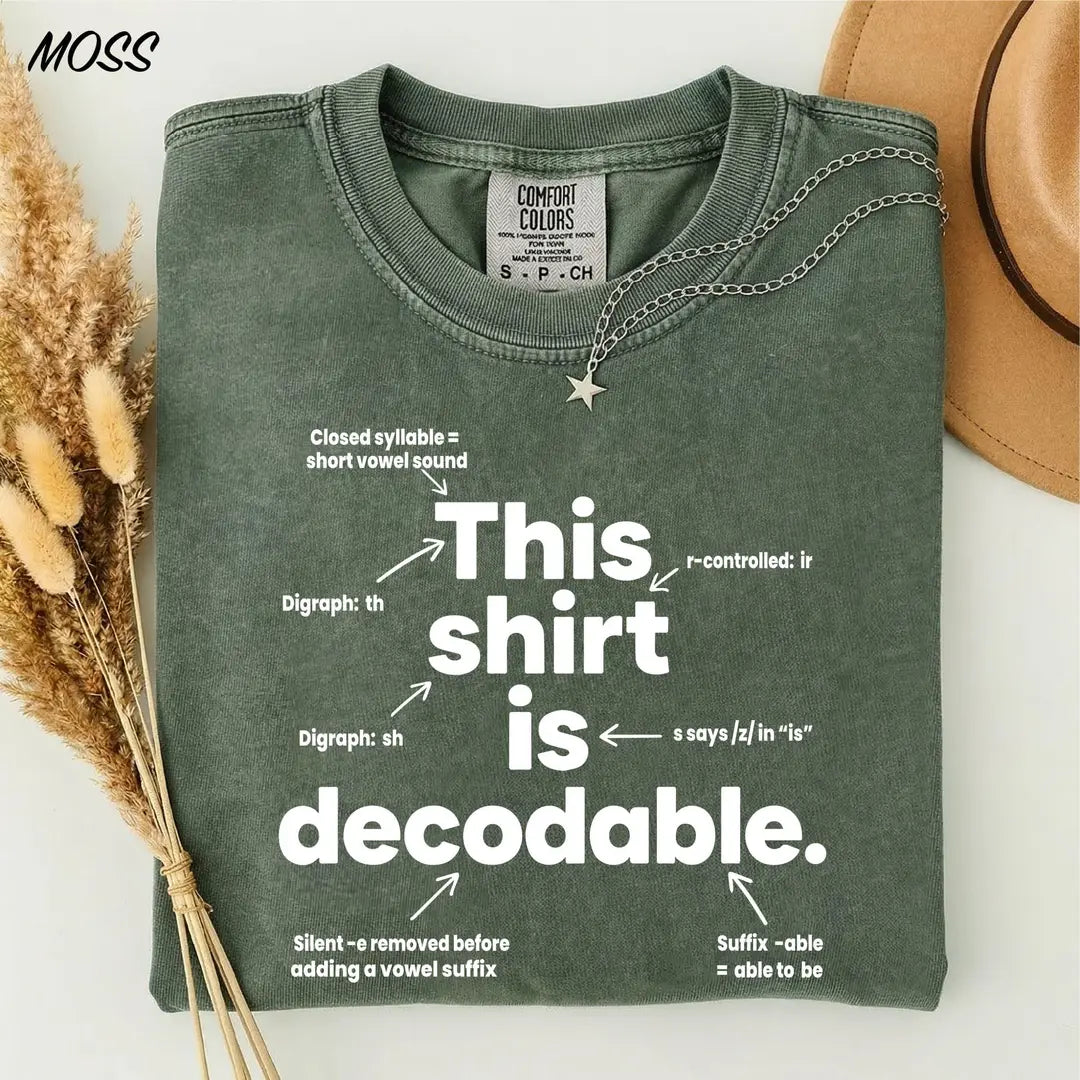 Moss Comfort Colors 1717 tee with 'This shirt is decodable' and phonics teaching annotations.