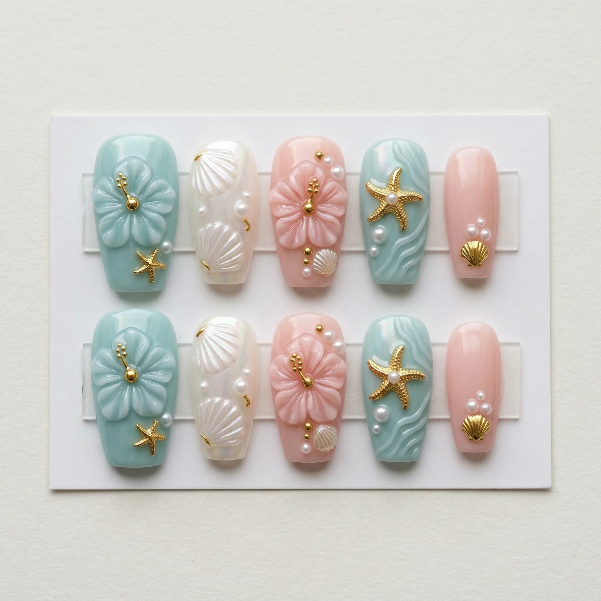 tiffany blue 3d coffin medium press on nails hibiscus gold starfish flat lay 01