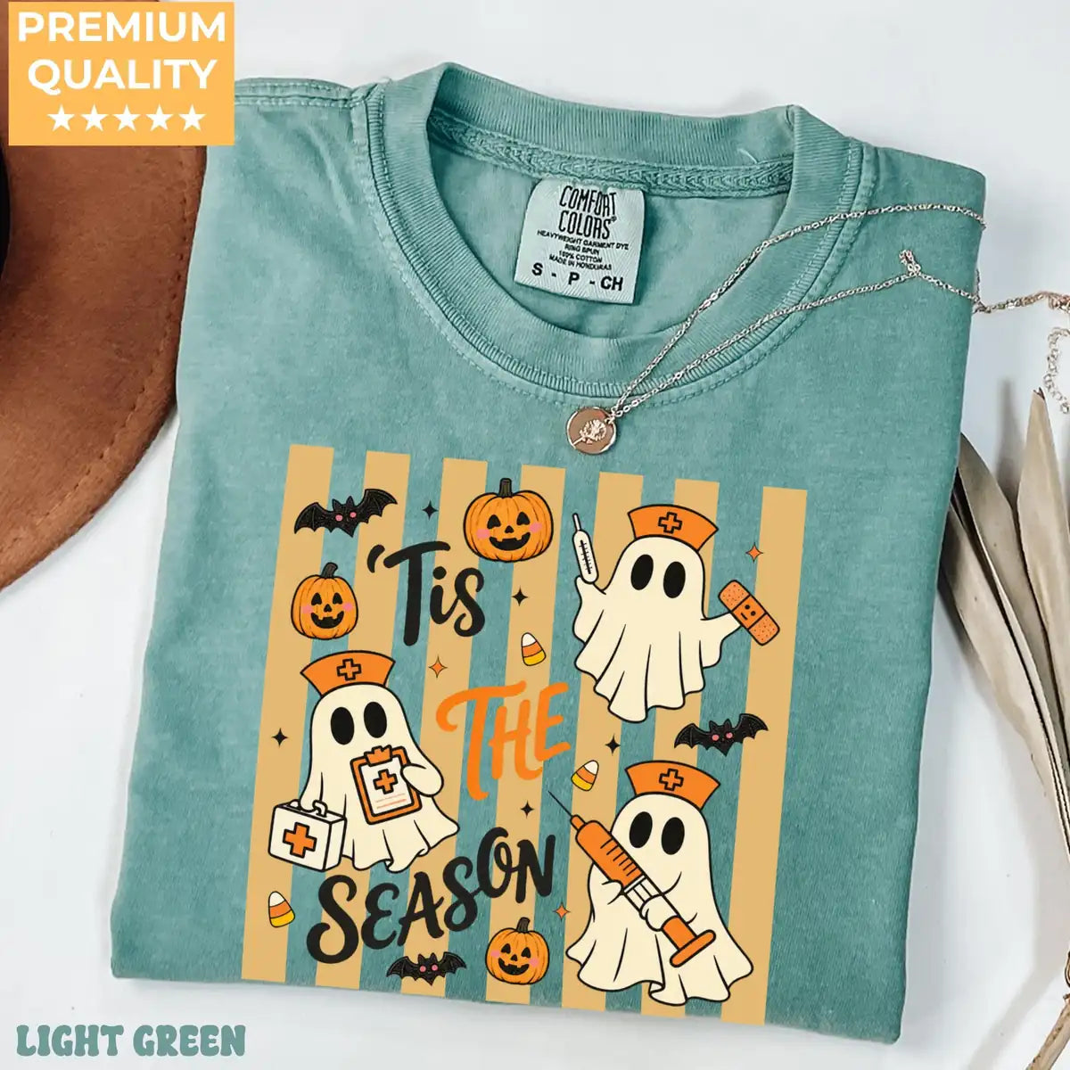 Light Green Comfort Colors T-shirt with Tis The Season Nurse Ghosts Medical Halloween artwork