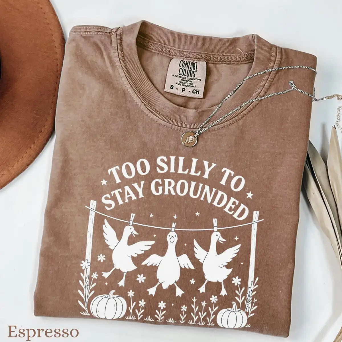 Comfort Colors T-shirt in Pepper color featuring Too Silly To Stay Grounded geese graphic