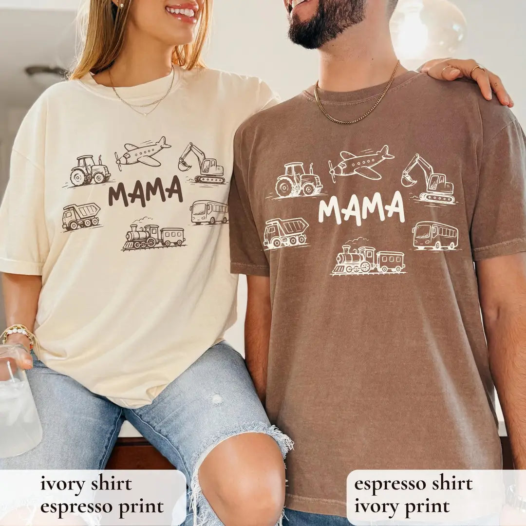Ivory tee with espresso print and Espresso tee with ivory print, both reading MAMA among sketched vehicles, worn by a couple