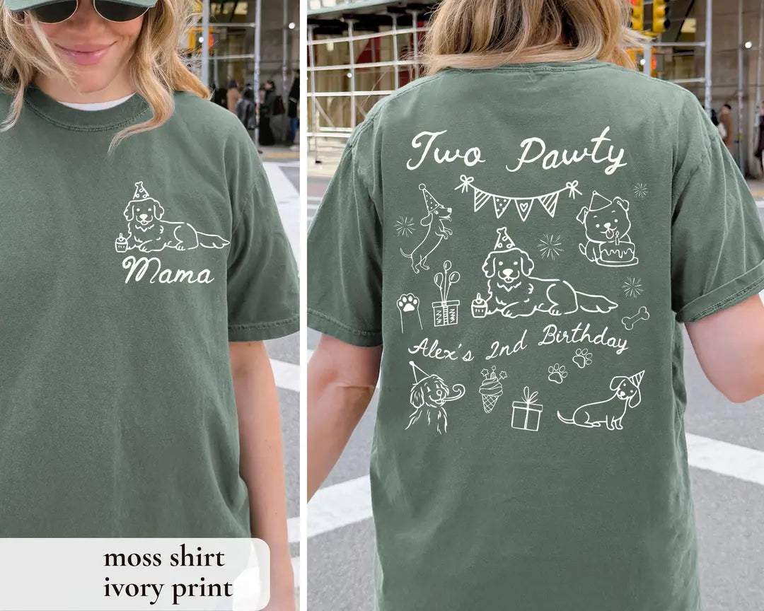 Woman in a Moss green Comfort Colors tee, front with an ivory dog and Mama, back with Two Pawty and Alex's 2nd Birthday