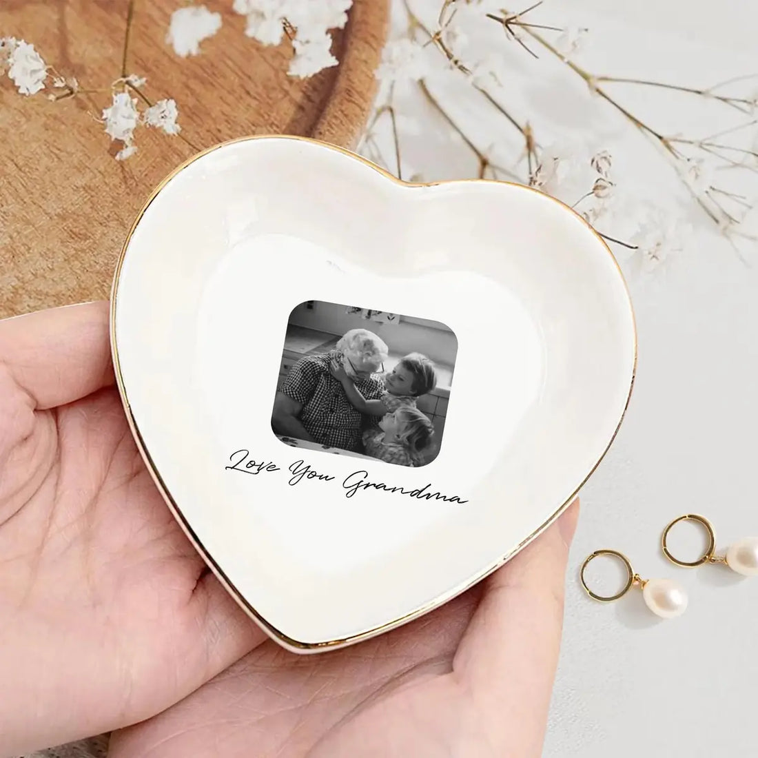 Close-up detail of glossy ceramic finish and gold rim on personalized family trinket tray