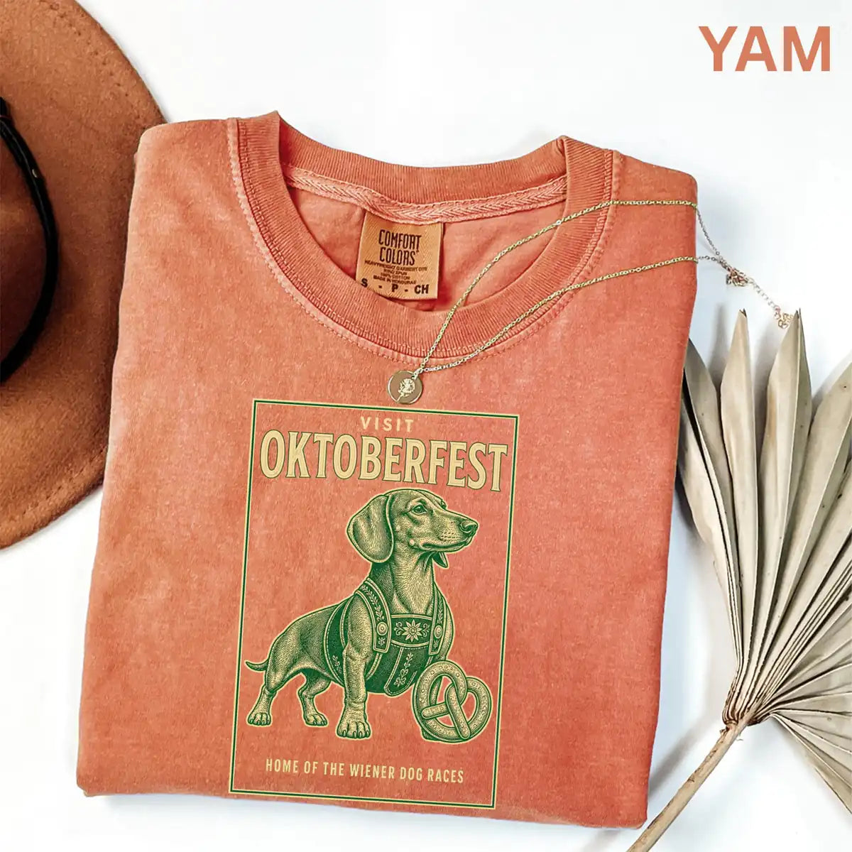 Woman wearing Violet Visit Oktoberfest Dachshund - Wiener Dog Halloween Comfort Colors T-Shirt