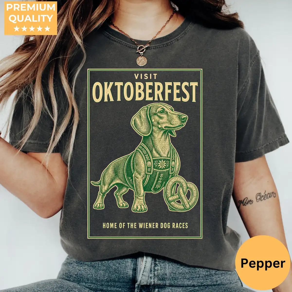 Black Comfort Colors T-shirt mockup showing Visit Oktoberfest Dachshund Halloween design