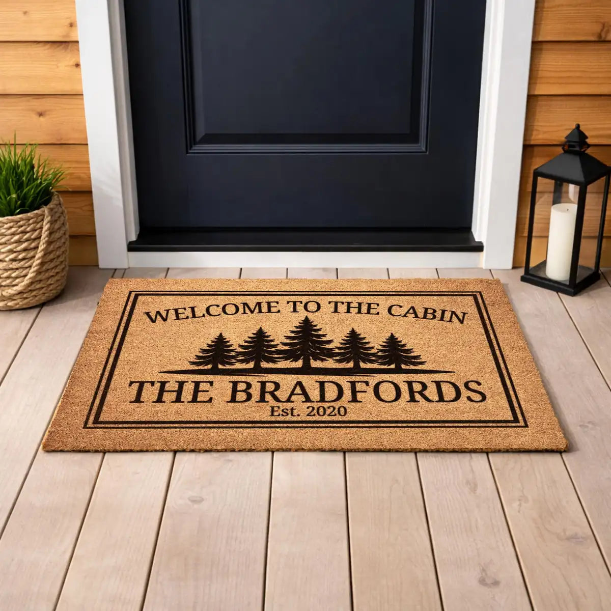 welcome to the cabin pine tree family name personalized doormat flat lay 04