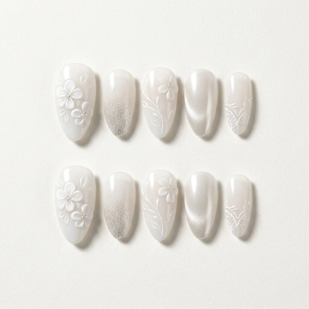 white 3d chrome almond press on nails flower leaf gemstone flat lay 01
