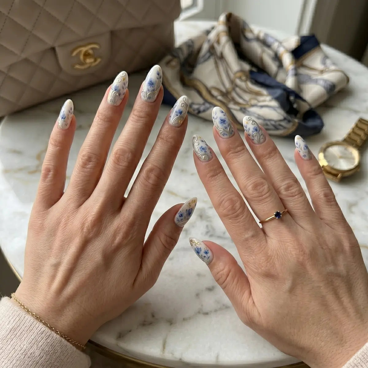 white blue hand painted almond press on nails gold foil flower silver swirl detail 03