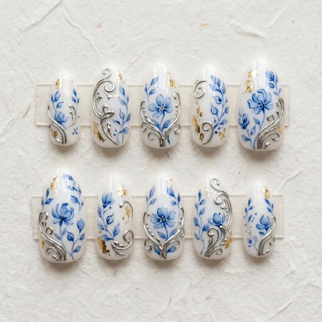 white blue hand painted almond press on nails gold foil flower silver swirl mockup 01