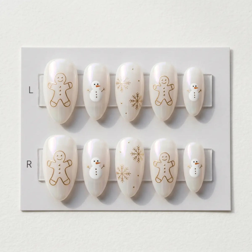 white pearl hand painted almond press on nails gingerbread snowman snowflake lifestyle 02