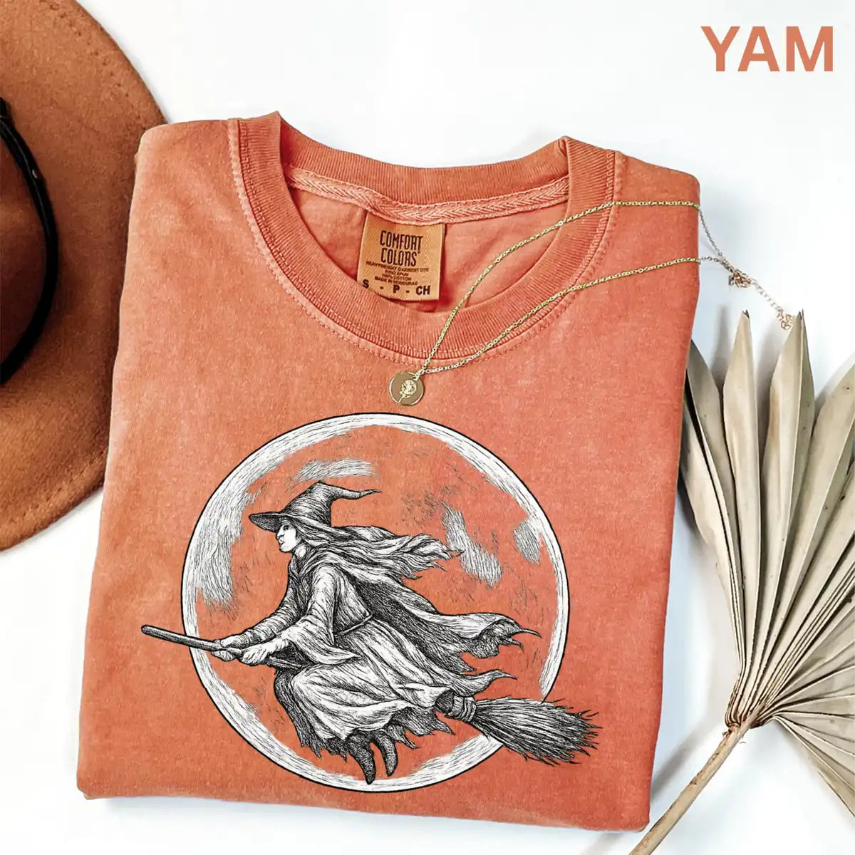 Comfort Colors T-shirt in Yam featuring flying witch graphic