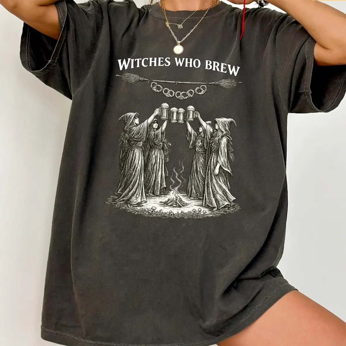 Woman wearing Moss Witches Who Brew - Oktoberfest Halloween Comfort Colors T-Shirt